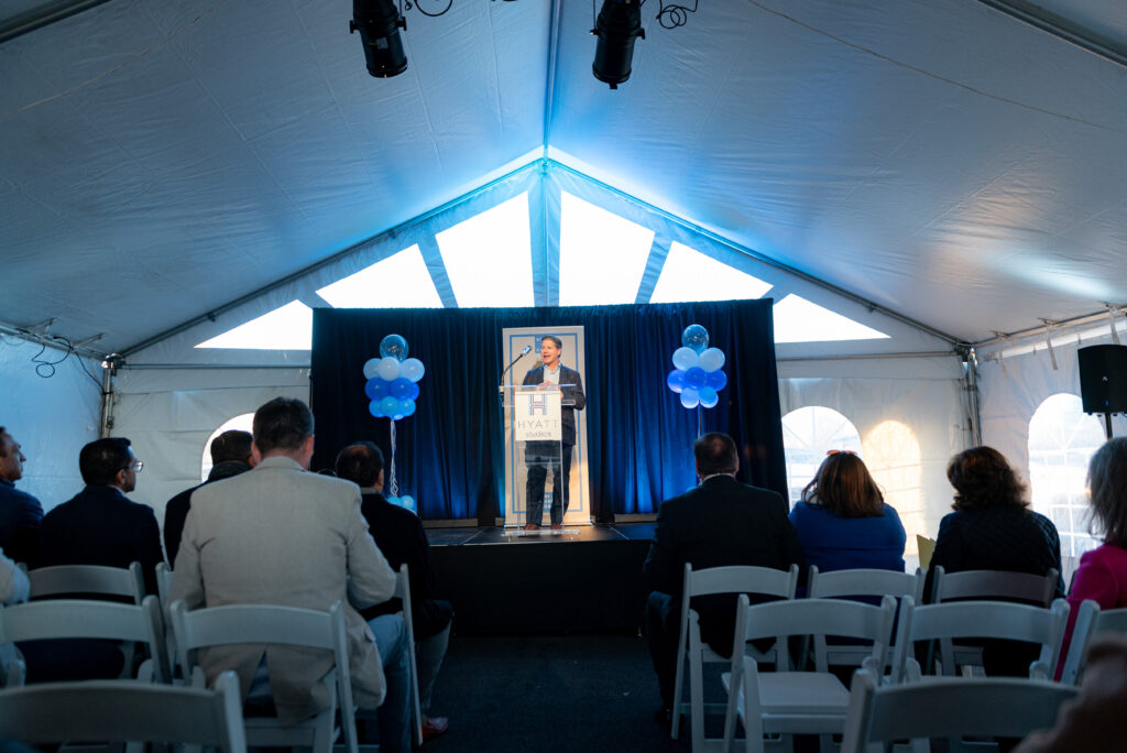 Beau Benton, President of LBA Hospitality, speaking at the Hyatt Studios Huntsville ribbon cutting event